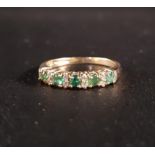 EMERALD AND DIAMOND RING the five emeralds separated by smaller diamonds, on nine carat gold