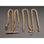TWO GOLD PLATED DOUBLE ALBERT CHAINS one with T-bar