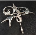 THREE SILVER OLA GORIE BROOCHES AND A STICK PIN the brooches formed as a stylised swan, a swallow