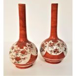 PAIR OF JAPANESE SATSUMA VASES with bulbous bodies decorated with panels of flowers, below long