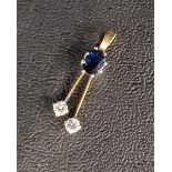 SAPPHIRE AND DIAMOND PENDANT the oval cut sapphire approximately 0.75cts above two round cut