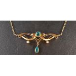 ATTRACTIVE ART NOUVEAU BLUE GLASS AND SEED PEARL PENDANT in scroll setting and on attached nine