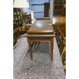 A VICTORIAN DESIGN MAHOGANY STOOL of rectangular form with turned bolsters on baluster legs 50cm (h)