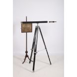 A LEATHERBOUND AND CHROME TELESCOPE on ebonised adjustable tripod together with a 19th Century