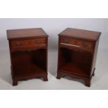 A PAIR OF MAHOGANY CROSS BANDED SIDE CABINETS each of rectangular outline with frieze drawer above a