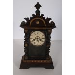 A 19TH CENTURY AMERICAN MANTEL CLOCK the rectangular case with glazed door between turned half