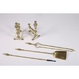 A FIVE PIECE 19TH CENTURY BRASS FIRE SET comprising set of three brass fire irons each with an urn