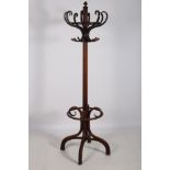 A CIRCA 1950s BENTWOOD HAT COAT AND STICK STAND the cluster column with four open stick compartments