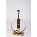 A GILT AND BRASS TABLE LAMP the open wood circular frame on a rectangular base 51cm (h)