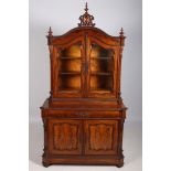 A 19TH CENTURY CONTINENTAL MAHOGANY AND BURR WALNUT DISPLAY CABINET the arched pediment with pierced