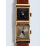 A Baume and Mercier, 1970s, 14 carat gold, dual time-zone, lady's wrist watch.