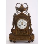 A Beaux Arts bronze mantle clock by Raingo Freres.