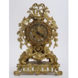 A Louis Phillipe, ormolu, silk suspension mantle clock