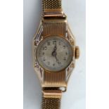 9ct gold lady's wrist watch.