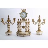 A Victorian gilt bronze and white marble, three-piece clock garniture.