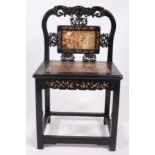 AN ORIENTAL HARDWOOD AND MOTHER OF PEARL INLAID CHAIR WITH MARBLE SEAT the pierced carved top rail