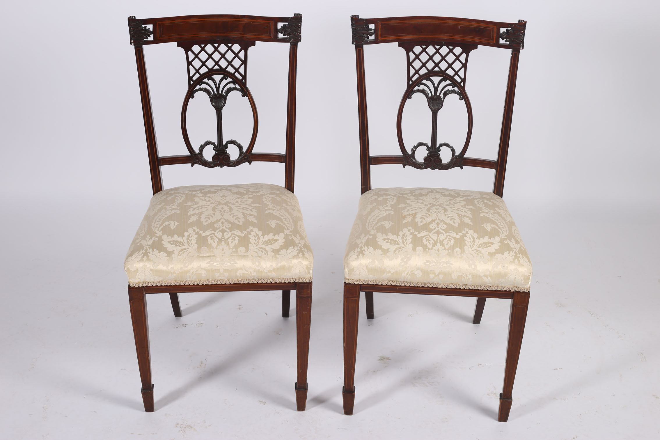 A PAIR OF 19TH CENTURY CARVED MAHOGANY AND SATINWOOD INLAID SIDE CHAIRS