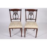 A PAIR OF 19TH CENTURY CARVED MAHOGANY AND SATINWOOD INLAID SIDE CHAIRS