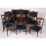 A 19TH CENTURY ROSEWOOD AND MARQUETRY SEVEN PIECE DRAWING ROOM SUITE comprising two seater settee