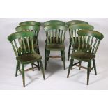 A SET OF TEN PINE AND GREEN PAINTED CHAIRS each with a curved top rail and shaped splats with