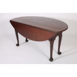 A GOOD GEORGIAN MAHOGANY HUNT TABLE the oval hinged top raised on cabriole legs with claw and ball