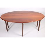 A GEORGIAN DESIGN MAHOGANY HUNT TABLE the oval hinged top raised on square moulded legs 76cm (h) x