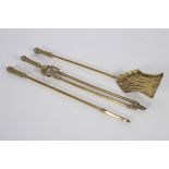 A SET OF THREE 19TH CENTURY BRASS FIRE IRONS