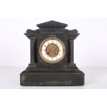 A BLACK SLATE MANTLE CLOCK