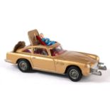 James Bond. Corgi Toys, 007?s Aston Martin DB5. from the film ?Goldfinger?, gold body with red