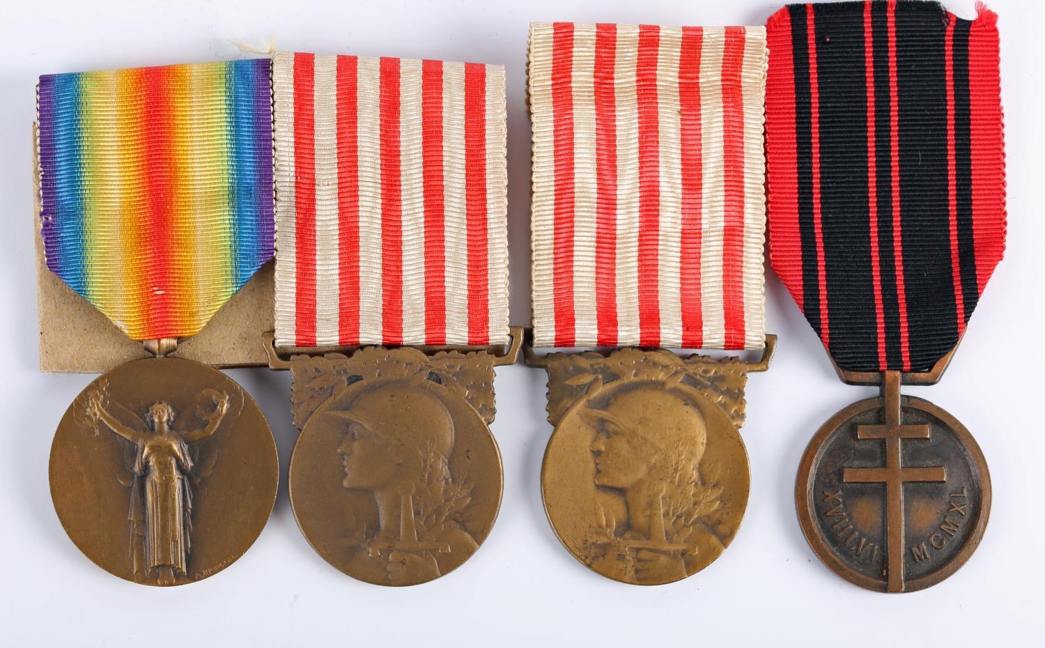 A 1914?1918 Inter-Allied Victory medal, two 1914?1918 Commemorative war medals and a Resistance