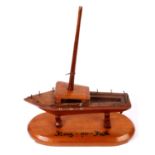 1974 Long Kesh prisoner art signed by Kieran Doherty. A carved-mahogany model yacht, named 'Rent