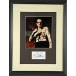 U2, Bono autograph signature. A clipped piece of paper, signed by Bono and attractively framed