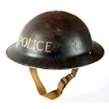 1939-45 A World War II Police brodie helmet, the black shell stencilled 'Police'.