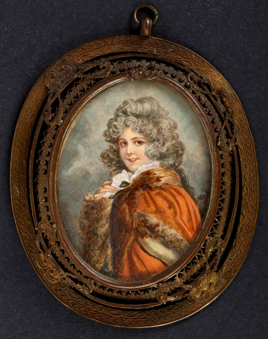 English school, 19th century. Portrait of a young beauty wrapped in a fur-lined cloak. Oil on