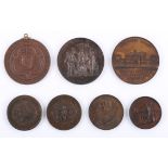 A collection of Irish educational award medals. A St Patrick's College, Carlow copper medal; The