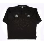 Rugby, New Zealand. Jersey signed by the All Blacks, including Richie McCaw after his first