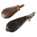 A Sykes powder flask and a leather shot flask.