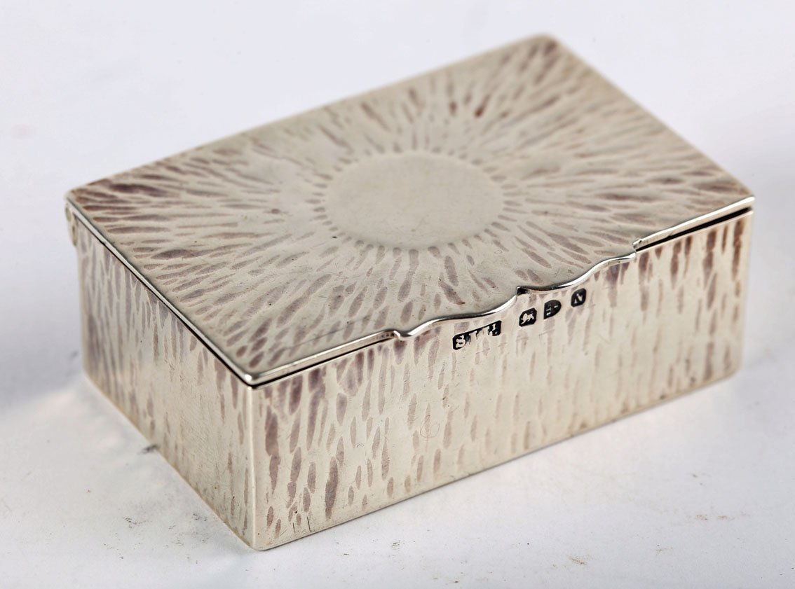 A Victorian silver two-compartment stamp box by Stokes & Ireland, the lid chased with a sunburst,