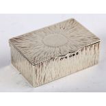 A Victorian silver two-compartment stamp box by Stokes & Ireland, the lid chased with a sunburst,