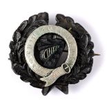 Victorian Irish silver-mounted bog oak brooch, from the collection of the Hon. Garech Browne,