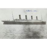 Titanic survivor's autograph. An image of the Titanic signed in blue ink "Millvina Dean".