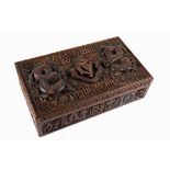 Connaught Rangers. A Kashmir carved hardwood box, the lid profusely carved in high relief with the