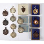 Newry Musical Feis, 1930-35 thirteen prize medals. Seven silver medals, makers' marks for Arthur