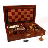 A Victorian, brass-inlaid mahogany games compendium, the fitted interior containing three games