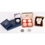 Selection of silver coins, Austria Mozart 1991 medal in .999 silver, Barbados $10, Canada Olympics
