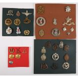 A collection of military badges. Includes Scottish regiments, Black Watch, Argyll and Sutherland