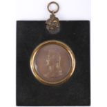 A late 18thC gilt metal circular embossed relief cameo portrait of William Pitt, head and