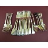 A set of WIV silver fiddle pattern table forks, dessert spoons and forks (12 table forks, 8
