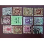 Twelve Victorian and later stamps with interesting imperfections not in catalogue