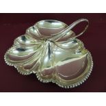 A silver club shaped hors d'oeuvres tray with loop handle - Sheffield 1910 - 15.5 ozt
